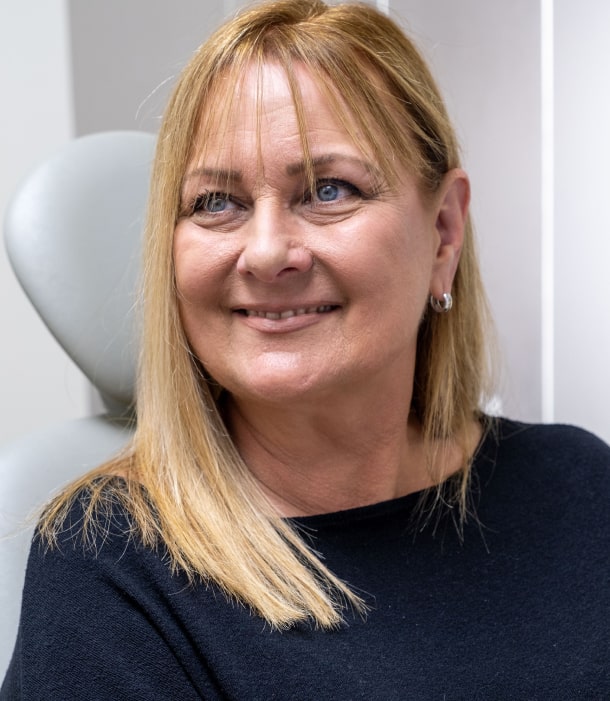 A happy B Well Dental Studio patient with a full, healthy smile in Weston, FL