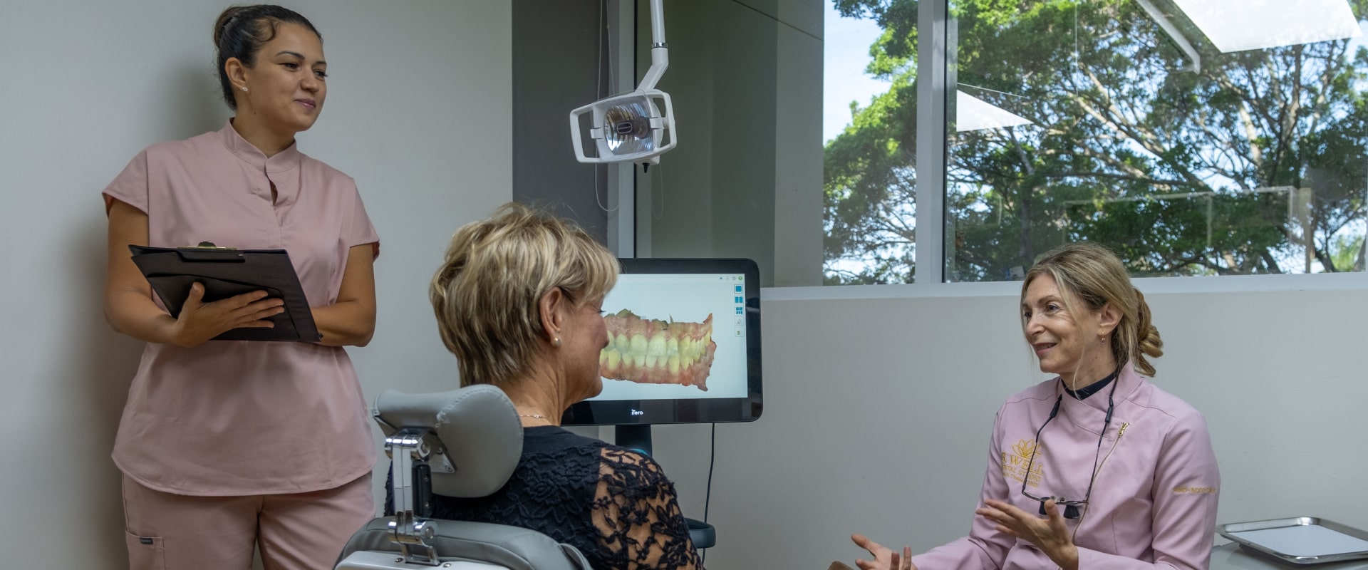 A photo of our doctor talking with patient