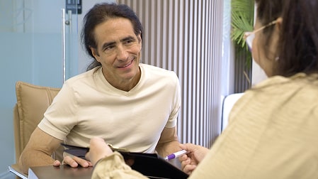 A photo of our happily smiling client