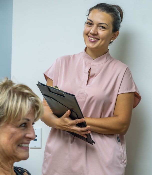 A photo of our happily smiling team member and our patient
