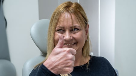 A photo of our happily smiling client