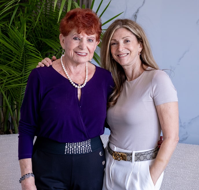 Doctor Thanos with patient smiling together